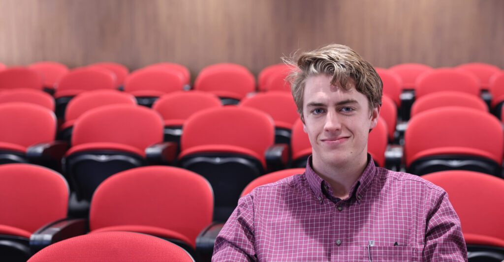 Homepage Slider Student in Lecture Theatre